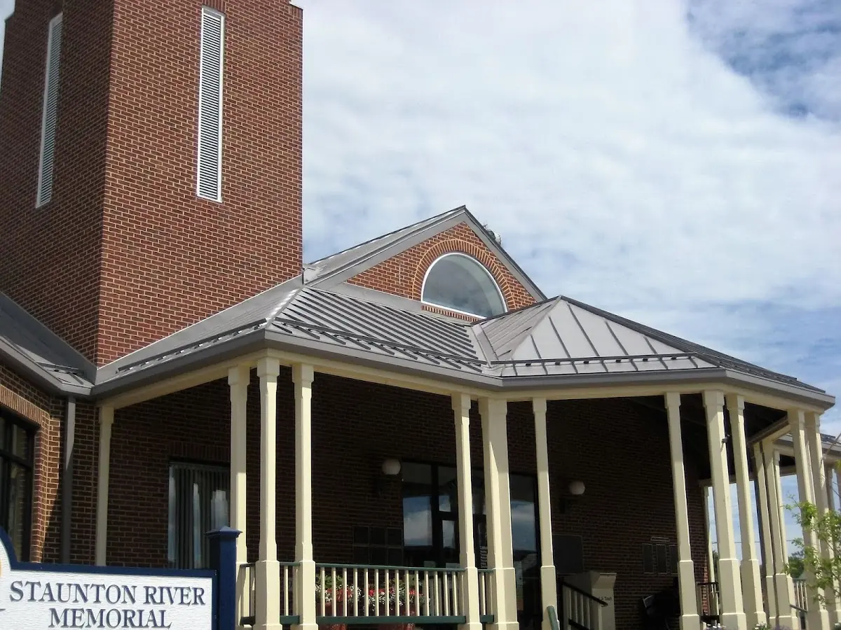 Skilled roofing craftsmen working on a residential roof in Beacon Square